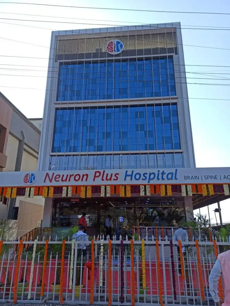 Exterior view of Neuron Plus Hospital in Savedi, Ahilyanagar, where Dr. Avinash Gadekar's clinic is located.